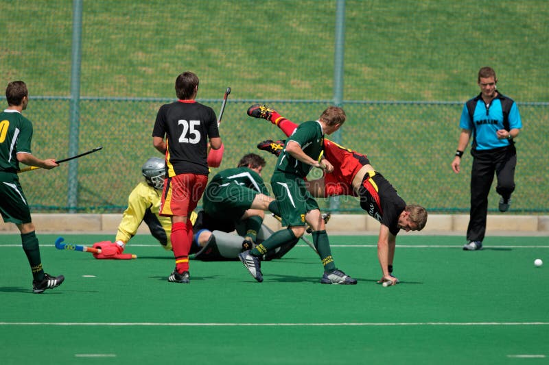 Mens field hockey action editorial photo. Image of active 12540156