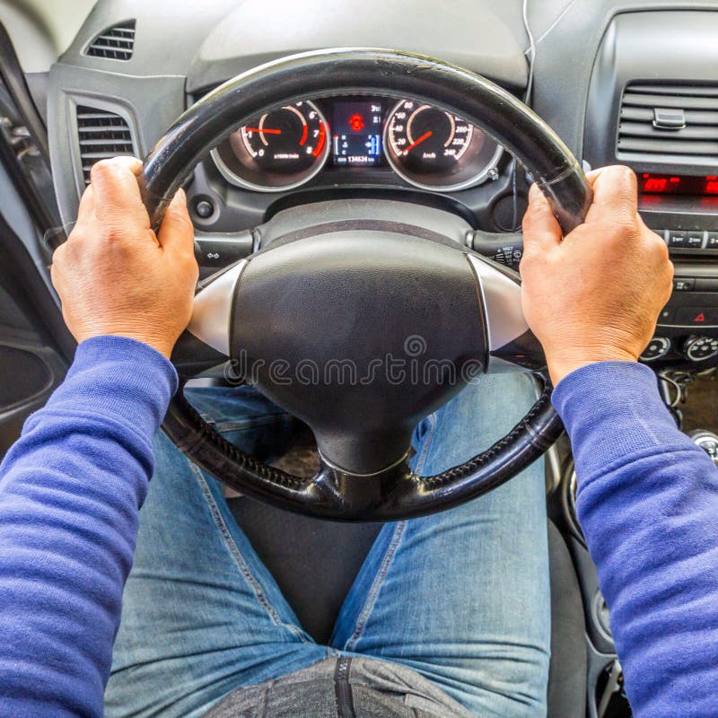 The Driver`s Hands on the Steering Wheel. Stock Image Image of glove