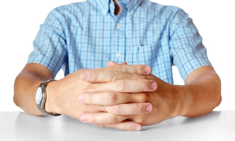 Men s hands sitting opposite at the table