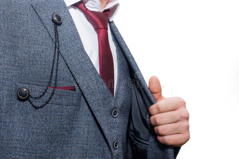 Man in white shirt, blue jacket and red tie Stock Photo