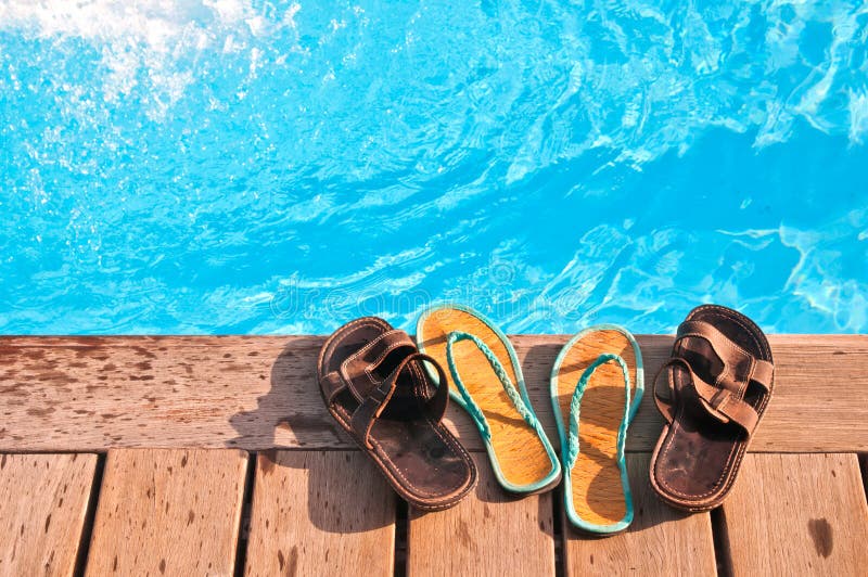 Poolside Flip Flops stock photo. Image of holiday, head - 9837808