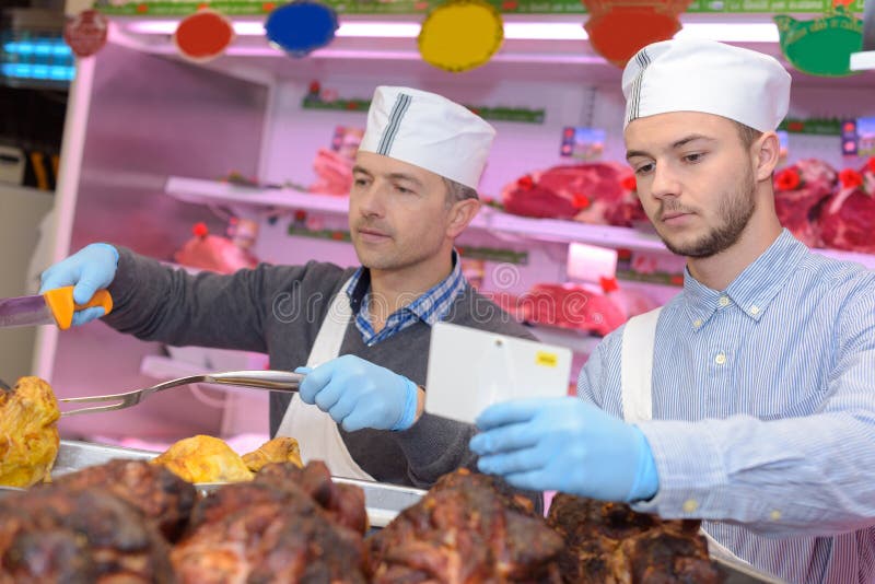 Men Serving Cooked Chickens Stock Photo Image of succulent, fork