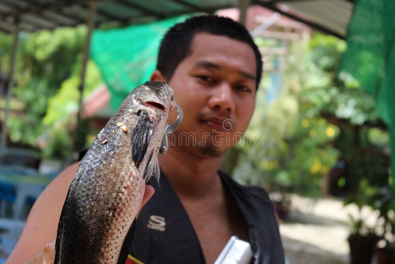 Men smile editorial stock photo. Image of fish, hook 55595973