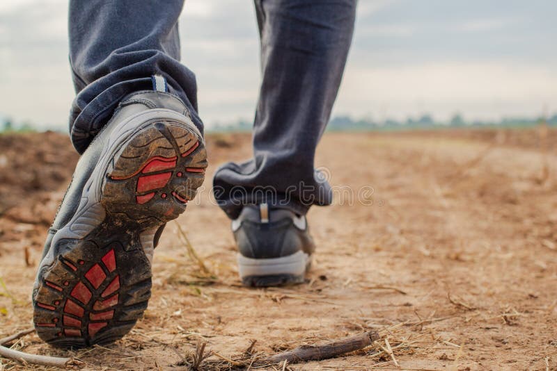 Men Wear Jeans and Wear Walking Shoes on the Dirt Road Stock Photo - Image  of summer, dirt: 170351158