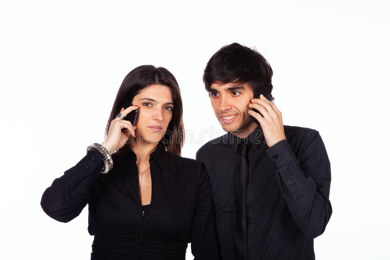 Men and woman talking on the phone stock photos