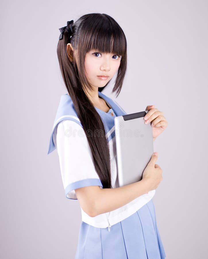 Menina adolescente bonito japonesa da escola imagens de stock Menina adolescente bonito japonesa da escola imagens de stock