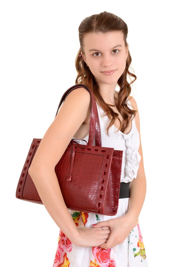 Menina adolescente do retrato com uma bolsa fotografia de stock