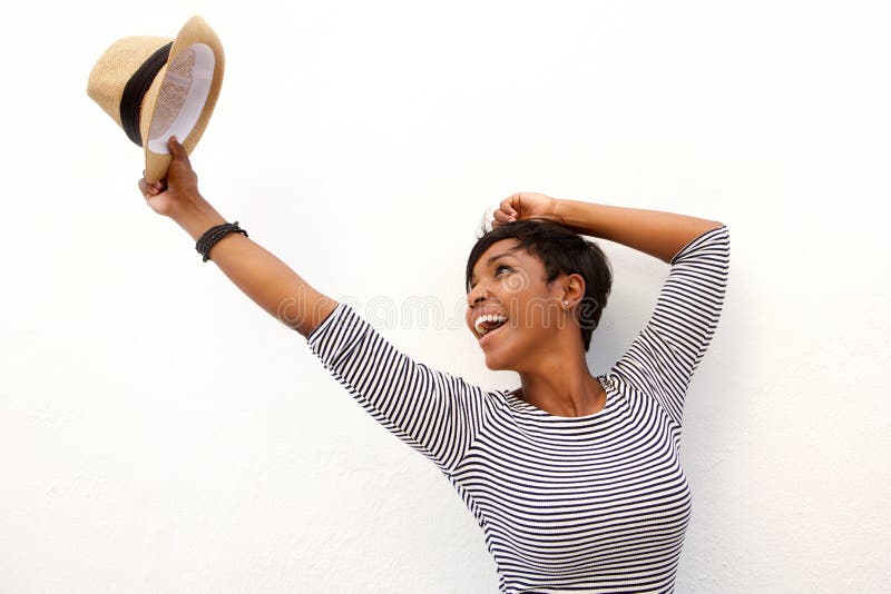 Portrait of a fun african american girl cheering with arms raised. Portrait of a fun african american girl cheering with arms raised