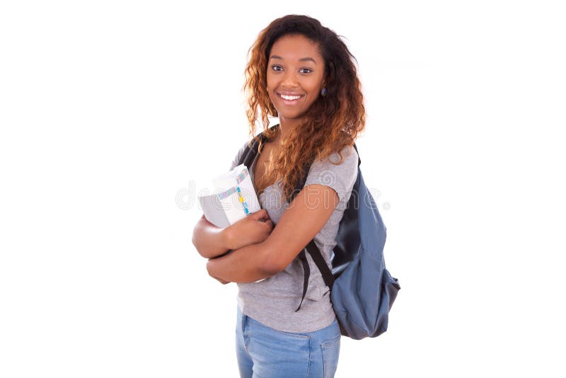 Menina afro-americano do estudante que guarda livros - pessoas negras