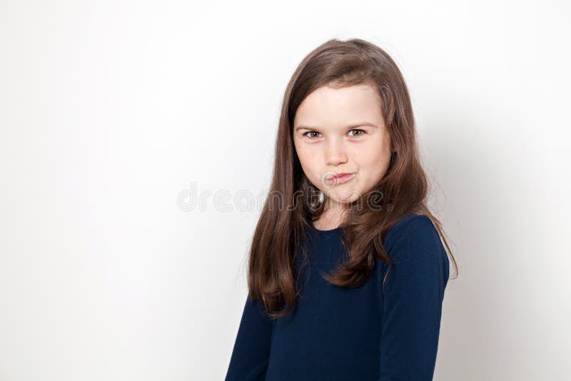 Rapariga a fazer beicinho imagem de stock