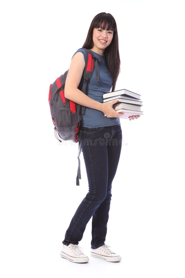 Menina asiática do estudante do adolescente com livros da instrução foto de stock Menina asiática do estudante do adolescente com livros da instrução foto de stock