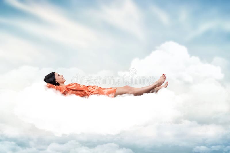 Menina em uma nuvem fotos de stock Menina em uma nuvem fotos de stock