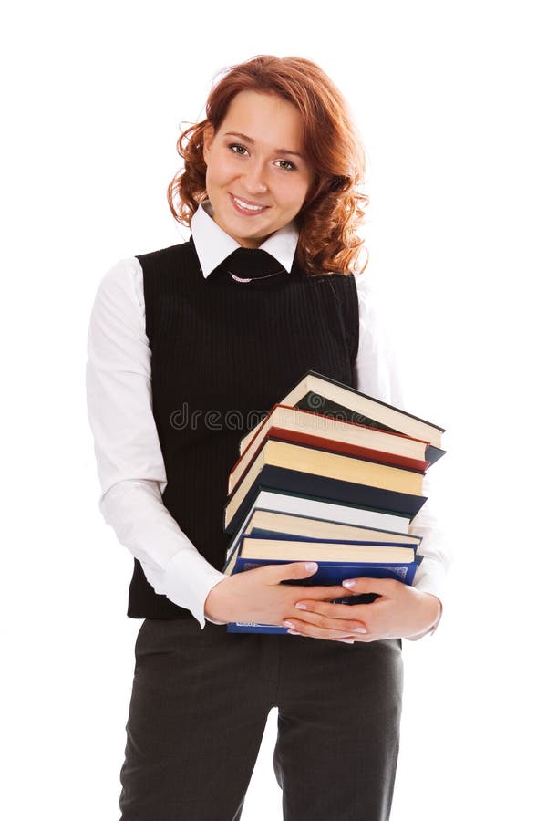 Menina bonita nova do estudante com livros à disposicão