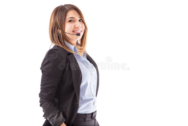 Menina bonito que trabalha em um centro de atendimento imagem de stock Menina bonito que trabalha em um centro de atendimento imagem de stock