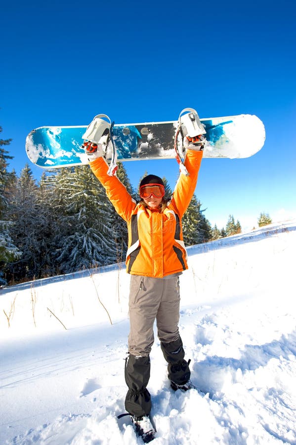 Menina com snowboard imagens de stock royalty free Menina com snowboard imagens de stock royalty free
