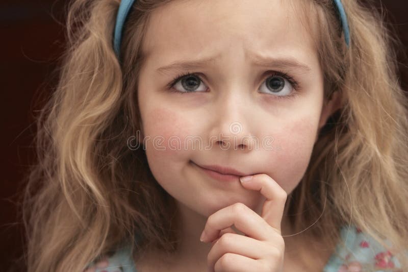 Menina confusa imagens de stock royalty free Menina confusa imagens de stock royalty free