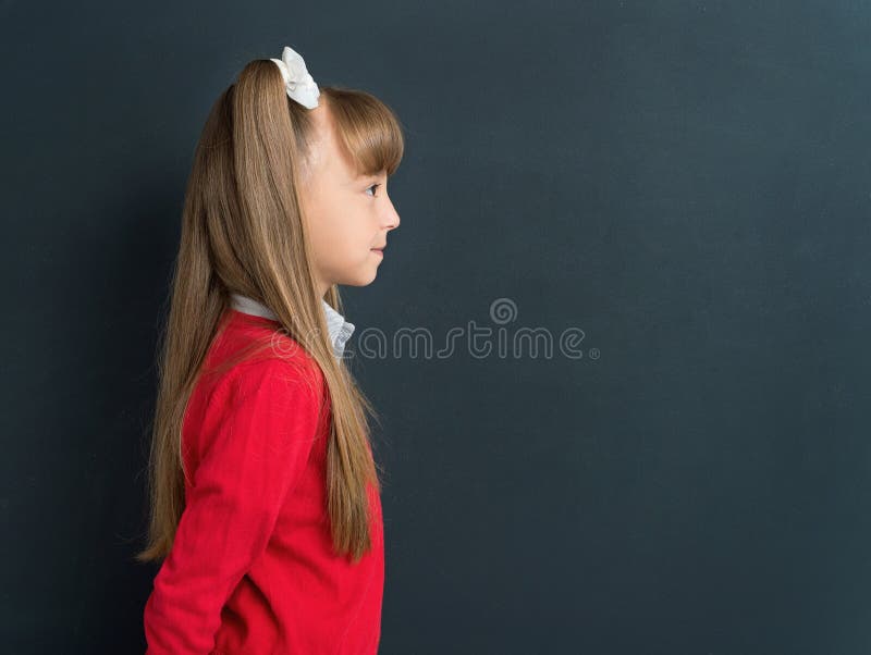 Menina de volta à escola foto de stock royalty free Menina de volta à escola foto de stock royalty free