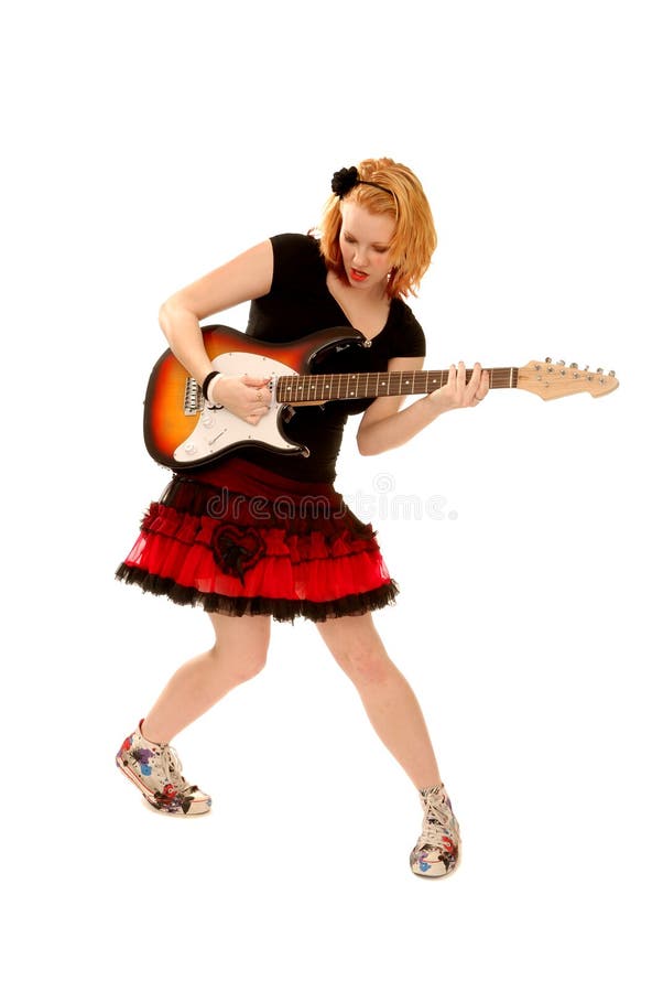 Menina do punk que joga a guitarra fotografia de stock Menina do punk que joga a guitarra fotografia de stock