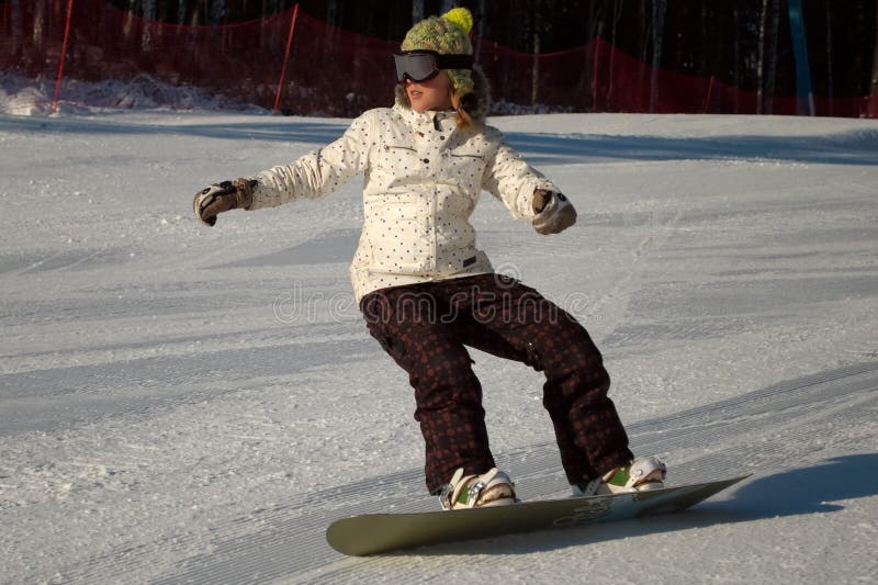 Menina do Snowboard imagens de stock Menina do Snowboard imagens de stock
