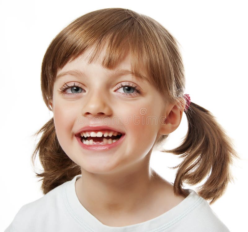 Menina feliz com dentes faltantes fotografia de stock Menina feliz com dentes faltantes fotografia de stock