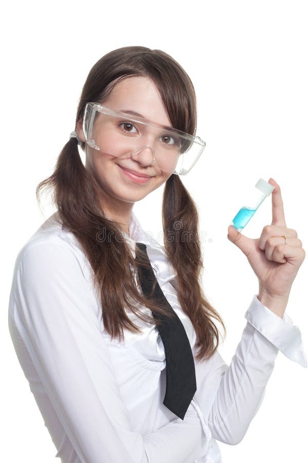 Happy smiling girl with test tube and protective glasses. Happy smiling girl with test tube and protective glasses