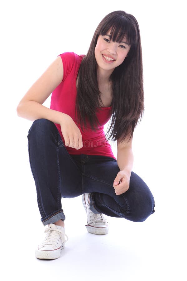 Menina japonesa feliz bonita do estudante do adolescente fotografia de stock royalty free Menina japonesa feliz bonita do estudante do adolescente fotografia de stock royalty free