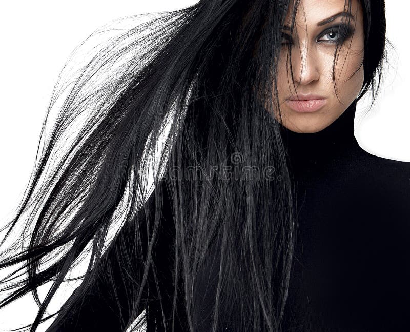 Menina moreno bonita com cabelo longo saudável e iso dos olhos azuis imagem de stock Menina moreno bonita com cabelo longo saudável e iso dos olhos azuis imagem de stock