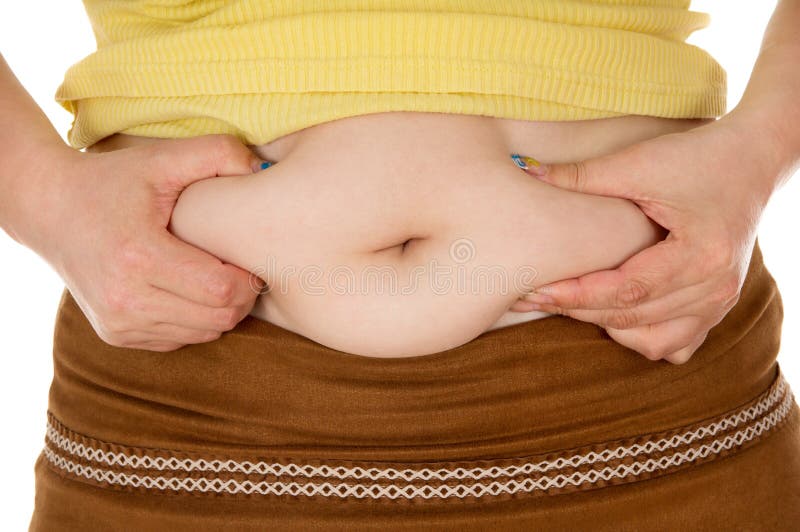 Girl shows off his fat belly isolated on white background. Girl shows off his fat belly isolated on white background