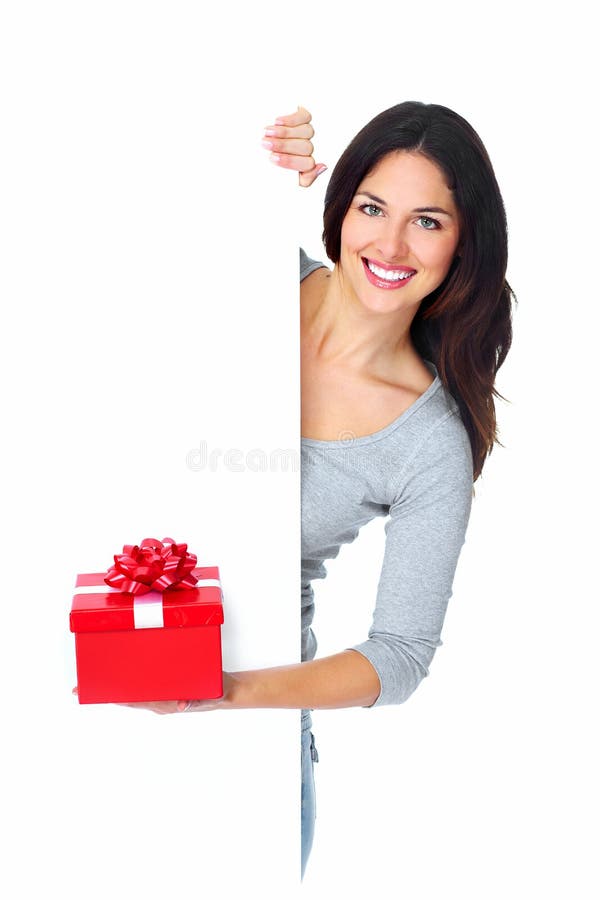 Menina nova bonita do Natal com um presente. fotos de stock Menina nova bonita do Natal com um presente. fotos de stock