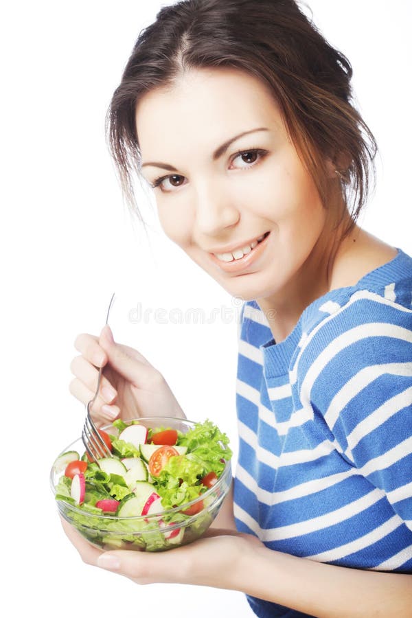 Menina que come o alimento saudável fotos de stock royalty free Menina que come o alimento saudável fotos de stock royalty free