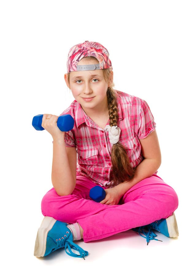 Menina que faz exercícios com pesos imagem de stock royalty free Menina que faz exercícios com pesos imagem de stock royalty free