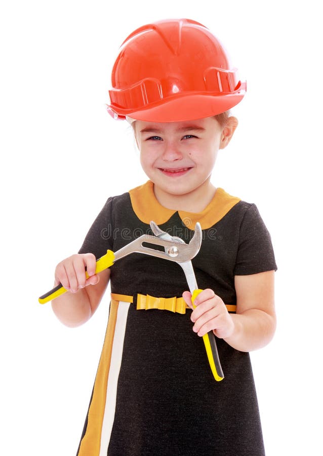 Menina que guarda um par de alicates fotos de stock Menina que guarda um par de alicates fotos de stock