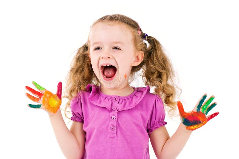 Menina que joga com aquarelas fotos de stock royalty free Menina que joga com aquarelas fotos de stock royalty free
