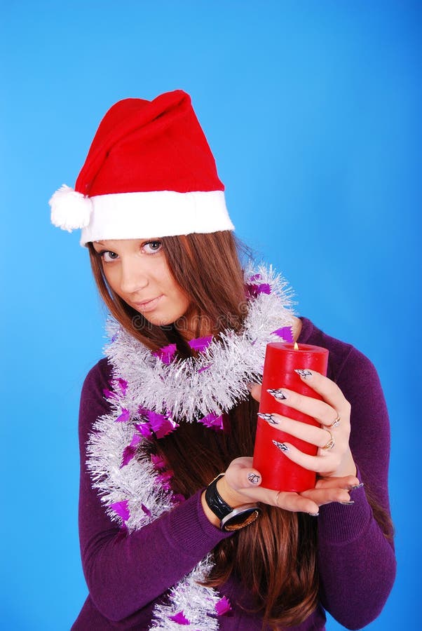 Menina 'sexy' bonita que desgasta a roupa de Papai Noel. imagens de stock royalty free Menina 'sexy' bonita que desgasta a roupa de Papai Noel. imagens de stock royalty free
