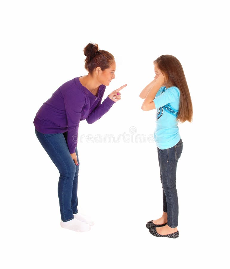 A mother is disciplining her young daughter and the girl holding her ears closed, isolated for white background. A mother is disciplining her young daughter and the girl holding her ears closed, isolated for white background.