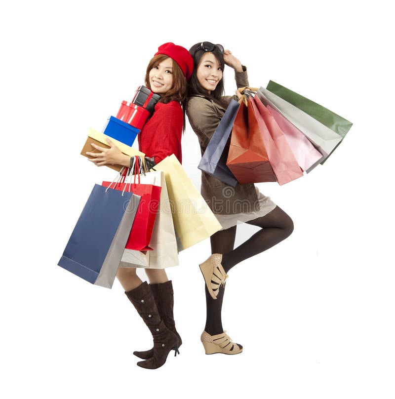 meninas da forma que prendem o saco de compra fotografia de stock meninas da forma que prendem o saco de compra fotografia de stock