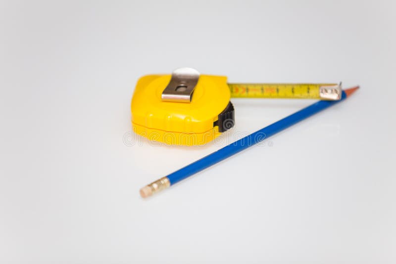 Mening van de het meterstok en potlood stock afbeeldingen