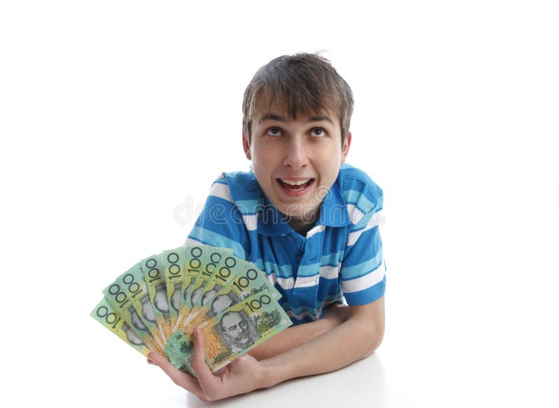 Menino com um ventilador de notas de banco do dinheiro fotografia de stock Menino com um ventilador de notas de banco do dinheiro fotografia de stock