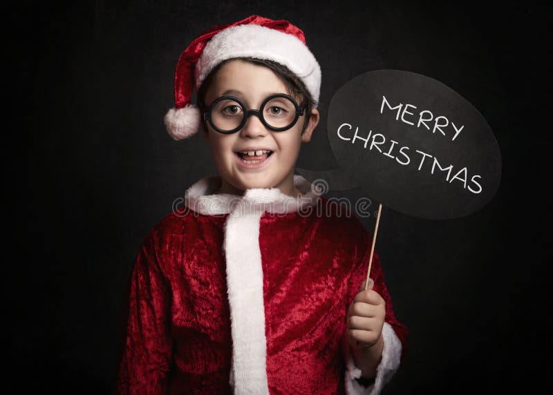 Menino engraçado no Natal imagem de stock Menino engraçado no Natal imagem de stock