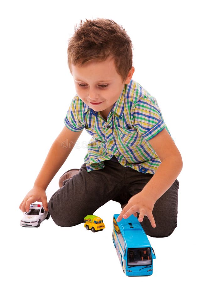 Um Menino Brinca Com Um Carro De Brinquedo No Rádio Segurando Um Controle  Remoto Imagem de Stock - Imagem de humano, jogar: 176431403