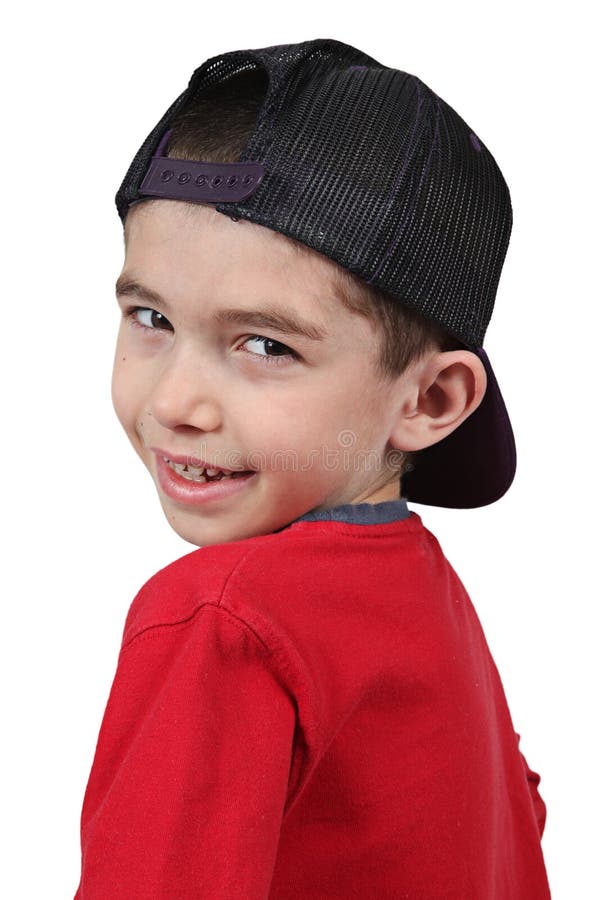Menino no boné de beisebol imagem de stock Menino no boné de beisebol imagem de stock