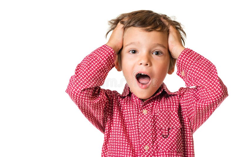 Menino novo que guarda sua cabeça fotografia de stock Menino novo que guarda sua cabeça fotografia de stock