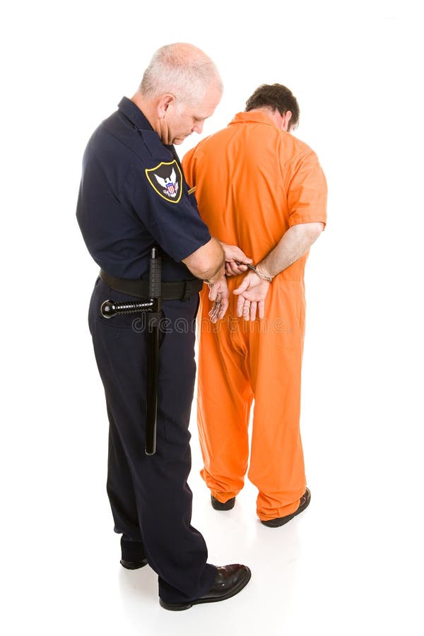 Prisonnier En Orange Est Menotté Par La Police. Complet Du Corps