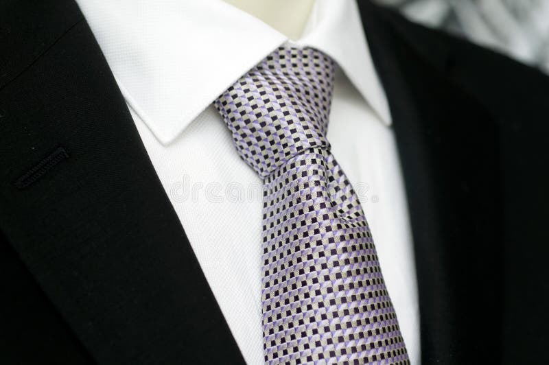 Mens black suit and sharp looking tie