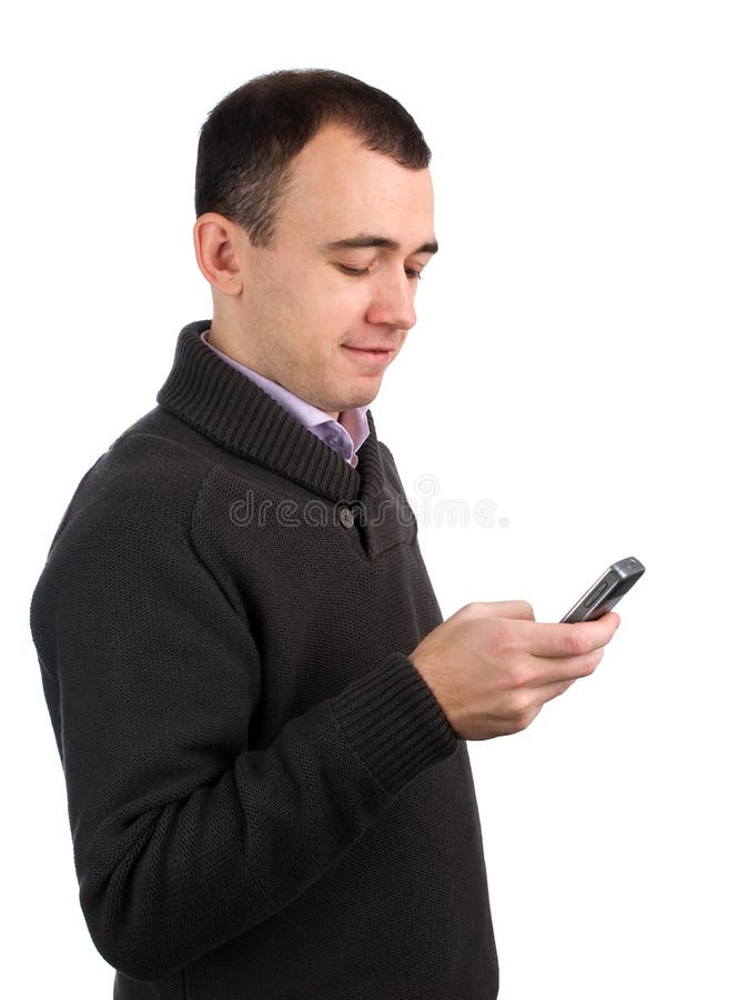 Young man calling on a mobile phone. Isolated over white. Young man calling on a mobile phone. Isolated over white