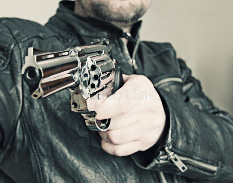 Mens met van de het pistool rubberaanval van het handkanon het geweldphotomanipulation royalty-vrije stock afbeeldingen Mens met van de het pistool rubberaanval van het handkanon het geweldphotomanipulation royalty-vrije stock afbeeldingen