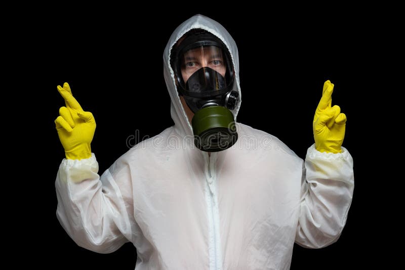 Mensch in einer Gasmaske hofft, giftige Verschmutzung zu vermeiden Glückliche Finger überquert stockfoto Mensch in einer Gasmaske hofft, giftige Verschmutzung zu vermeiden Glückliche Finger überquert stockfoto