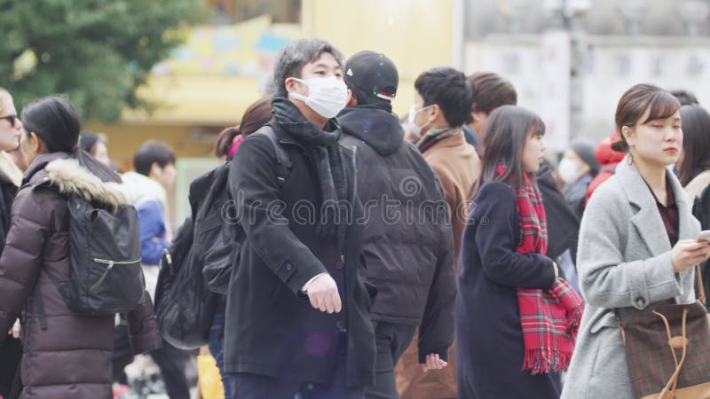 Menschen, die Shibuya-Überfahrt Büro Arbeiter und Gehälter. Tokyo-Japan