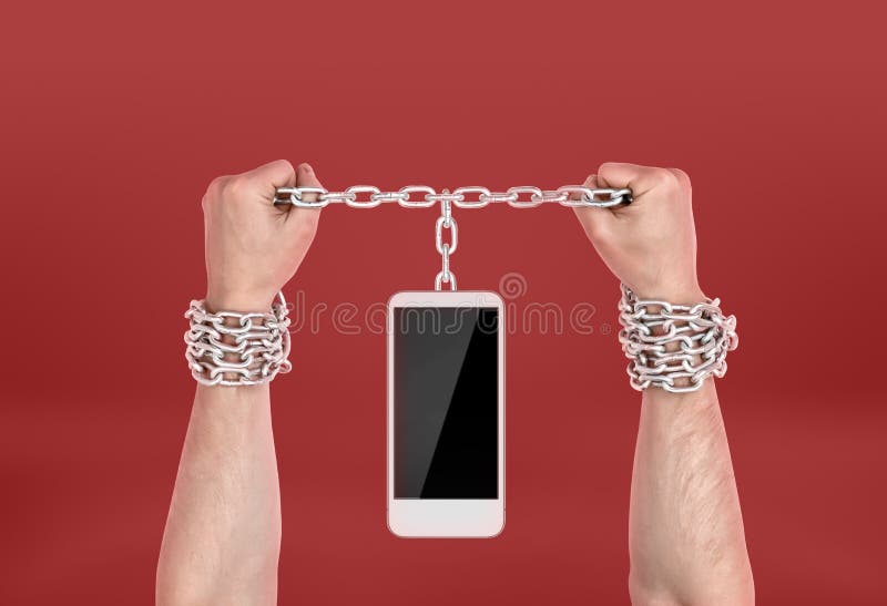 Menschliche Hände verkettet an das Telefon stockbilder Menschliche Hände verkettet an das Telefon stockbilder