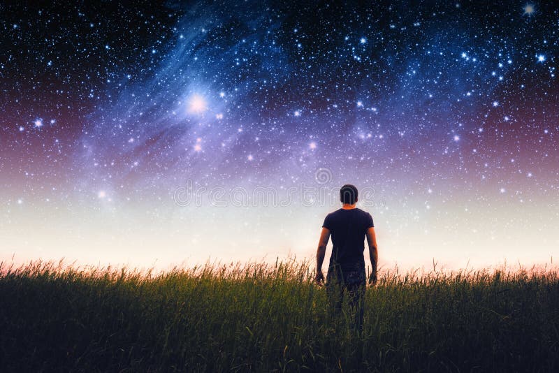 Silhouette of young man on stars sky. Elements of this image furnished by NASA. Silhouette of young man on stars sky. Elements of this image furnished by NASA.